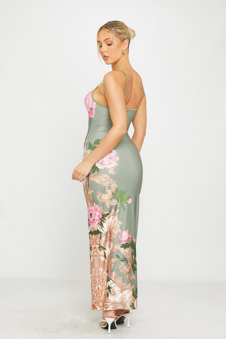 Grünes Maxikleid mit tiefem Ausschnitt und Riemchenmuster
