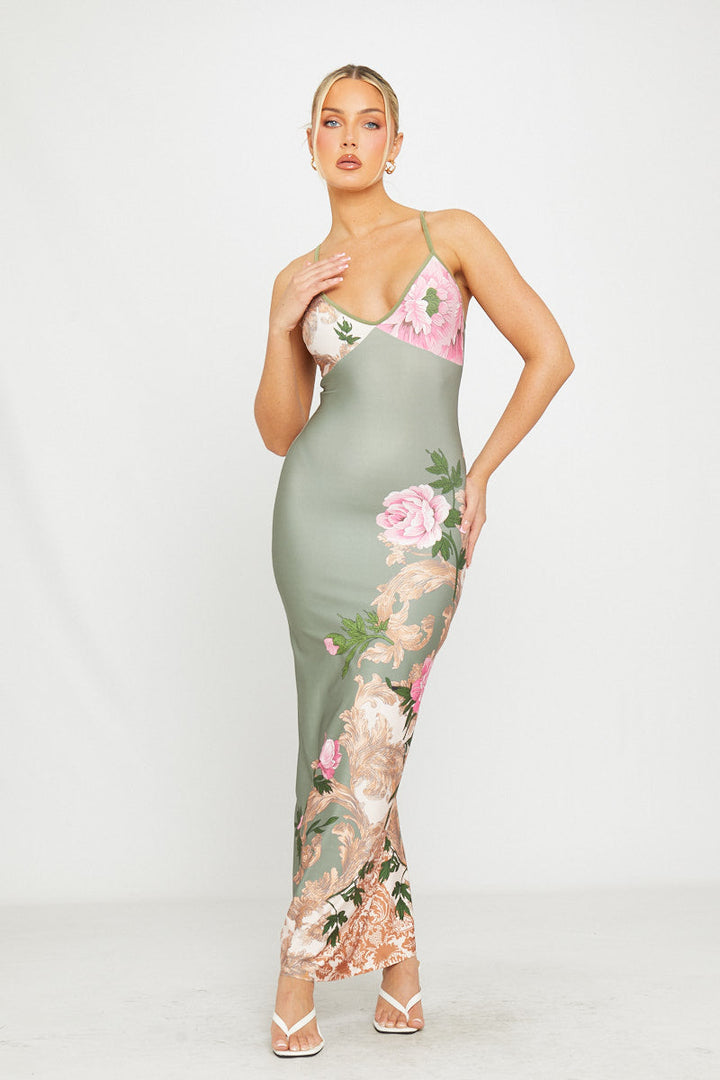 Grünes Maxikleid mit tiefem Ausschnitt und Riemchenmuster