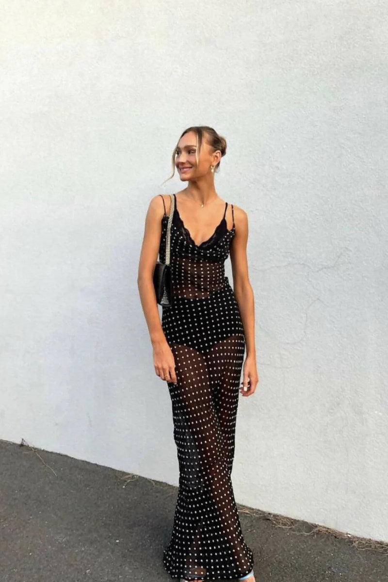 Schwarzes, halbtransparentes Maxikleid mit Wasserfallausschnitt und Punkten